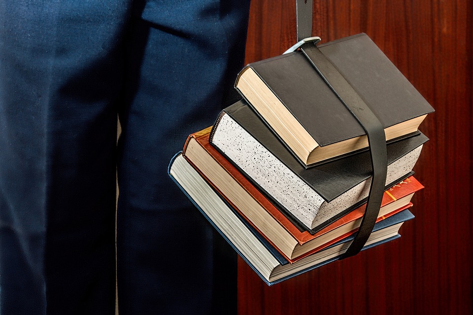 Books tied by a belt